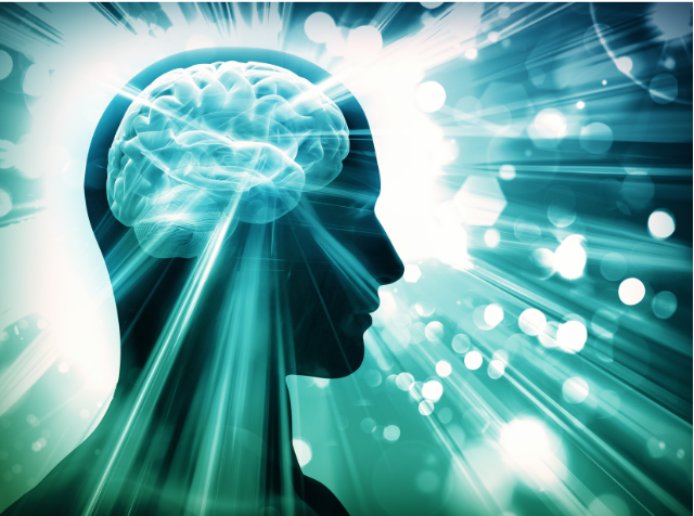 A glowing silhouette of a head with a visible brain surrounded by light beams, symbolizing cognitive health and keeping your mind sharp in retirement.