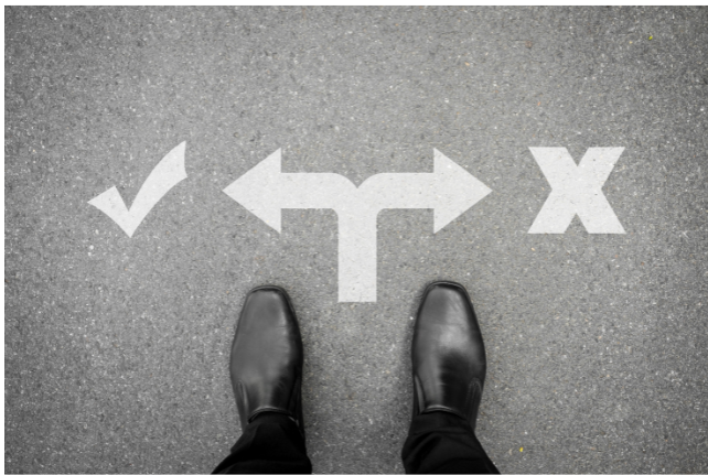 A conceptual image of a person standing at a crossroads with directional symbols, representing choices and possibilities.