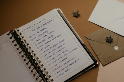 A planner with a list of goals.